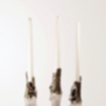 Underwood – handmade flame‑shaped brass candle holder with polished interior by Dal Furlo
