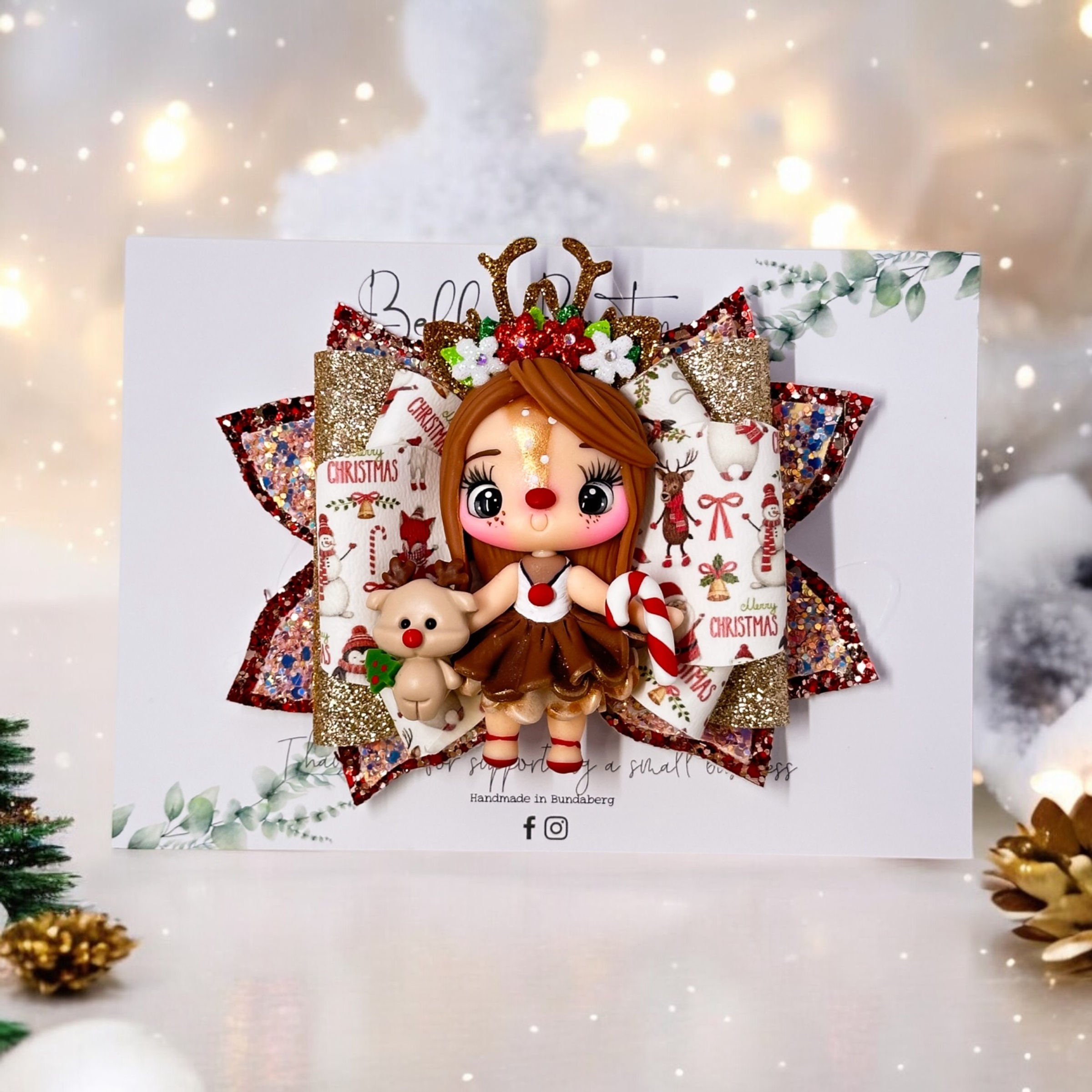 Reindeer with candy cane deluxe