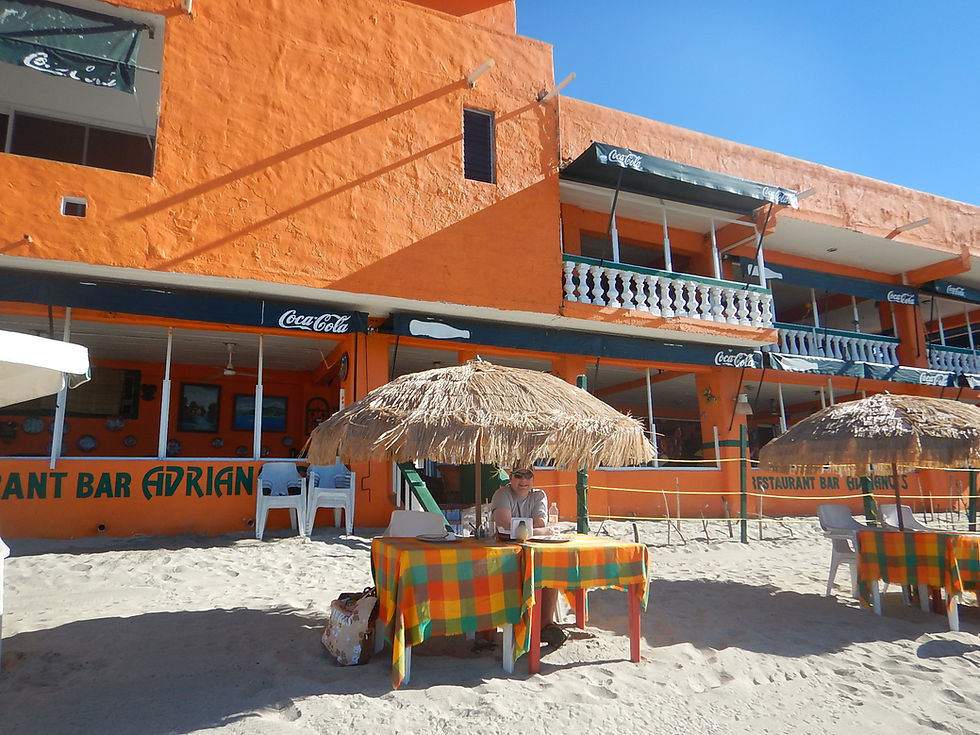 Enjoying breakfast on the beach at Adrianos Restaurant in Bucerias, Mexico.