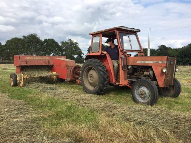 James Maclean in his 1964 Massey Ferguson 135 with a New Holland 174 baler (which has worked every year from 1972 to date!) attached.