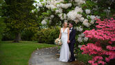 Romantic portrait of a wedding couple embracing in the grounds of Montalto Estate, Ballynahinch.