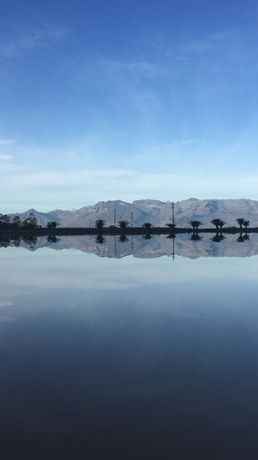 Mirror Image of our dam and mountains.JPG