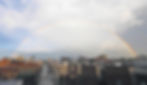 A rainbow arcs over Downtown Springfield.