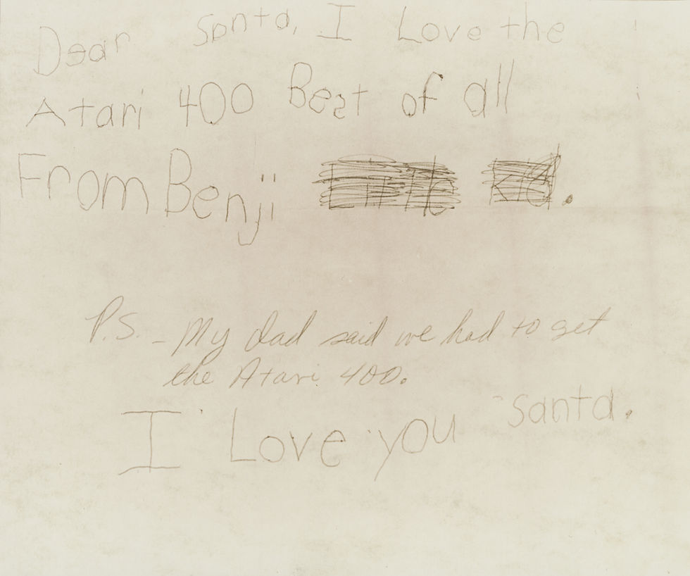 A letter, yellowed with age, from a child named Benji to Santa Claus. Midway through the letter, there is a post-script written in a different hand.
