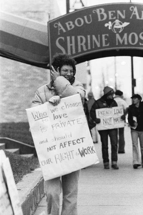 A woman protests Anita Bryant's rally at the Shrine Mosque.