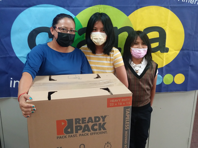 'It's Our Life Now': CIANA Clients Bring Home Computers Donated by TechFIN