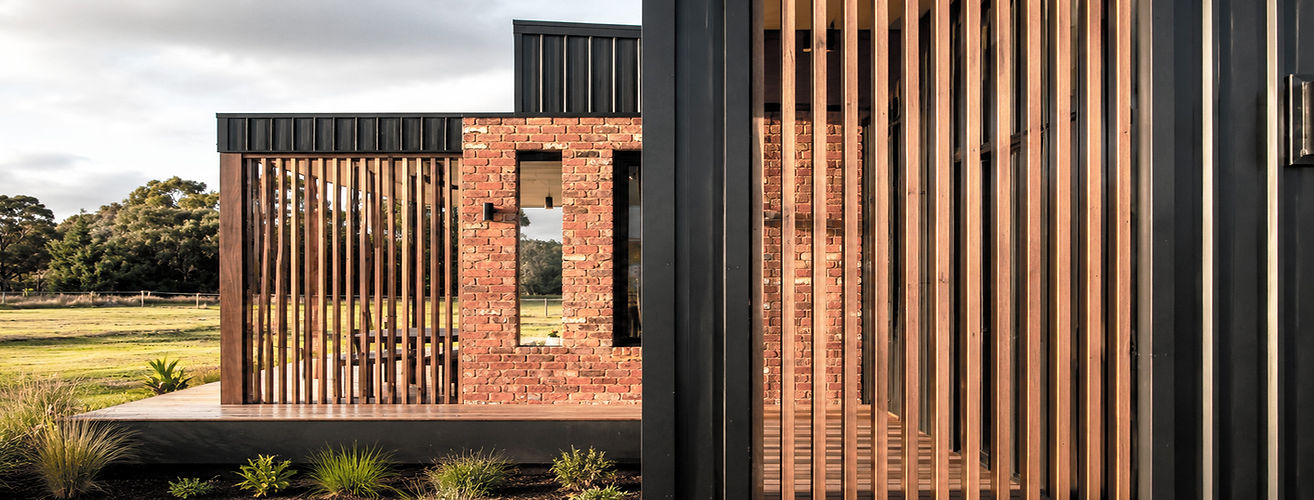 Mountview House by Adapt Architecture, featuring contemporary timber screening, exposed brickwork and natural landscaping in Victoria.