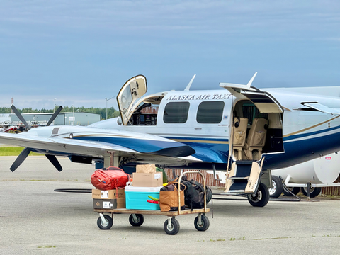 Groceries / Cargo Being Loaded into Navajo