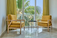 fig house balcony area with a beautiful sitting area and view