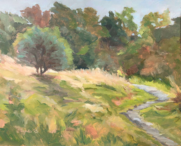 Woodland footpath, oil painting by Valentina Teghillo. It was painting en plein air on 12th August 2025 and it features a solitary tree on the slope of creamy-white grass next to the footpath meandering towards the woodland behind.