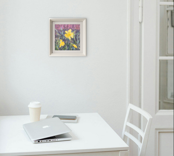 Photo showing the framed painting on the wall