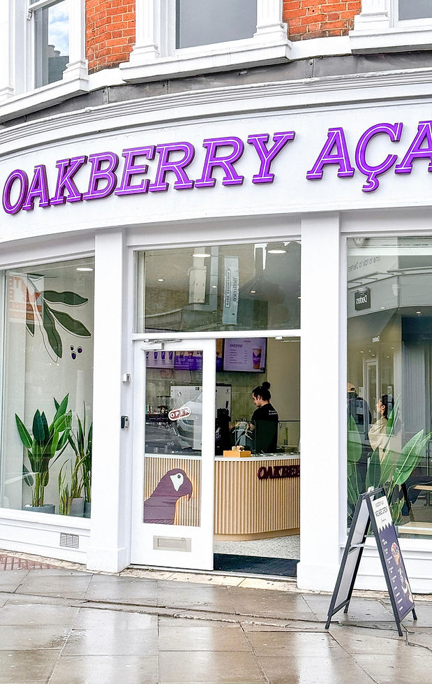 White shopfront image of Oakberry Acai Clapham Battersea store in London designed by Milk Rabbit
