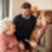 Young (30s age) Male (brown hair, no moustache) Social worker talking to an elderly lady w...ent.jpg
