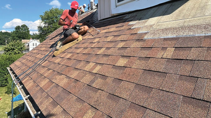 Top Roofing and Construction on residential roof