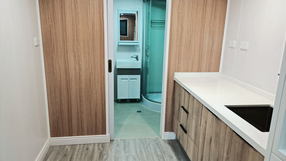 Ellalong luxury modern tiny home in Australia with stylish timber exterior and large windows