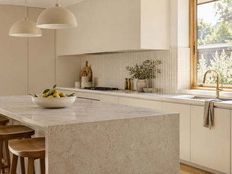 Light kitchen inspiration with pale cabinetry and a neutral stone island
