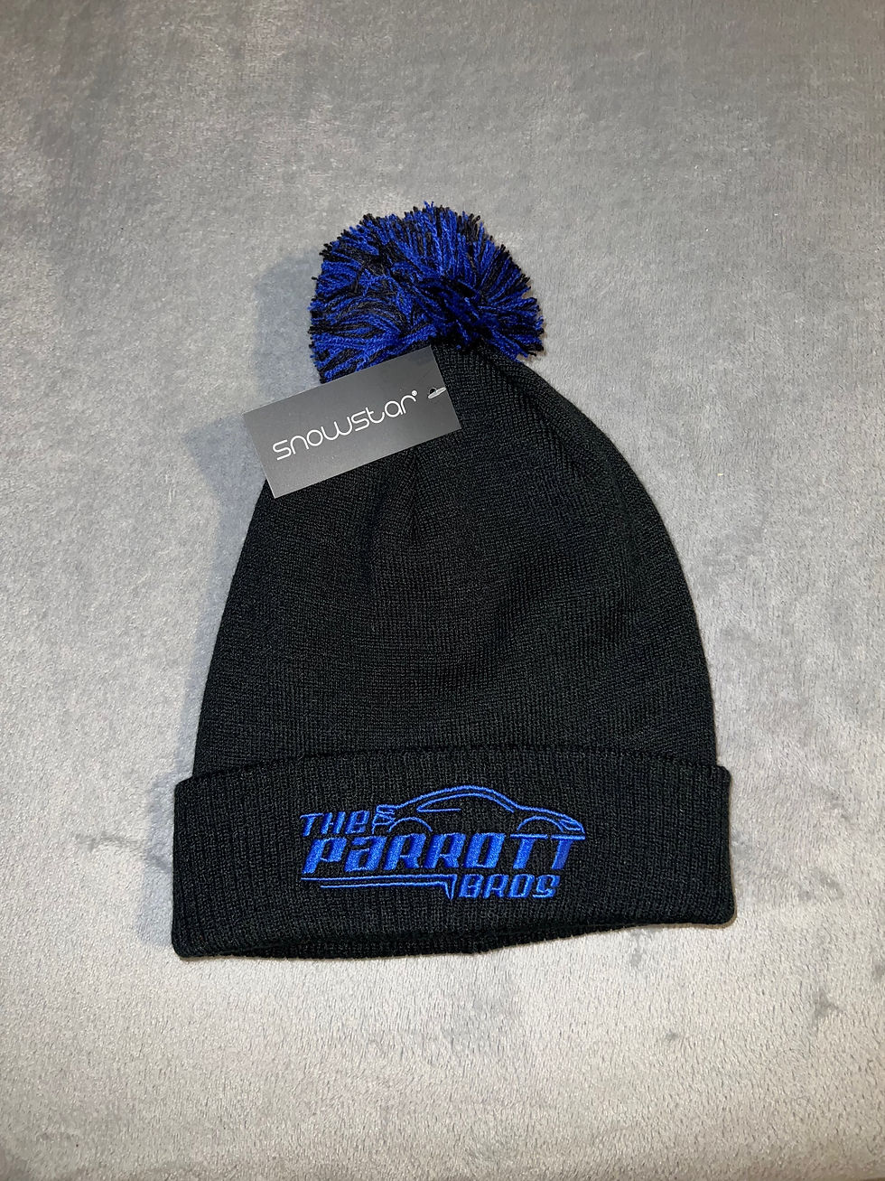Bobble Beanie In black with blue embroidery