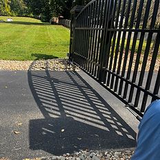 Iron gate with automatic opener