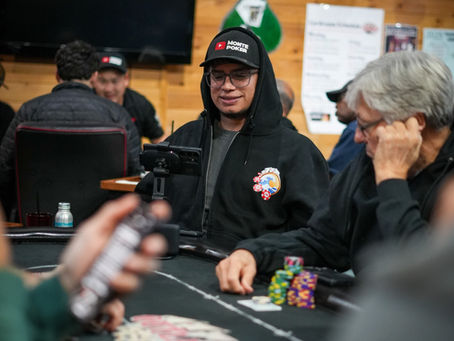 People having fun playing poker at Outlaws.