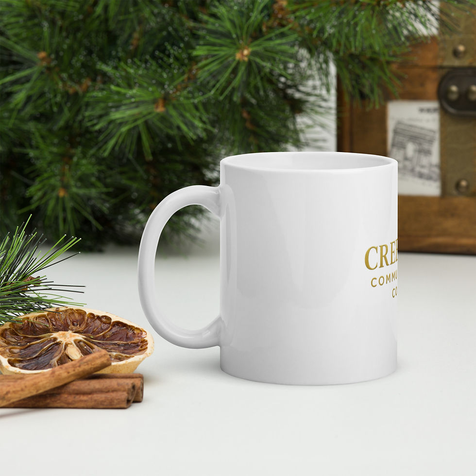 Thumbnail: White mug with gold CRE logo, cinnamon, orange, and pine