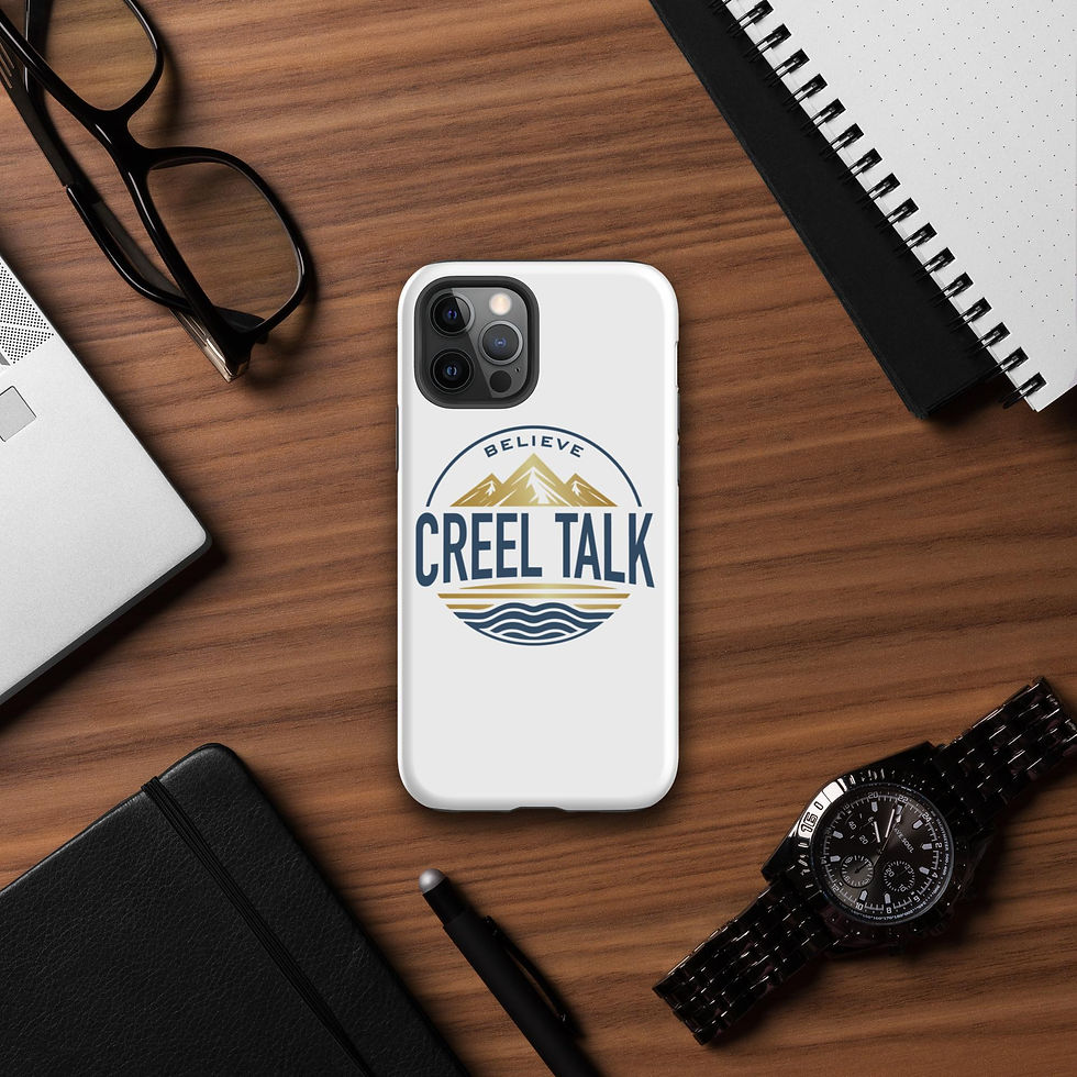 Thumbnail: White phone case with "BELIEVE CREEL TALK" logo on desk