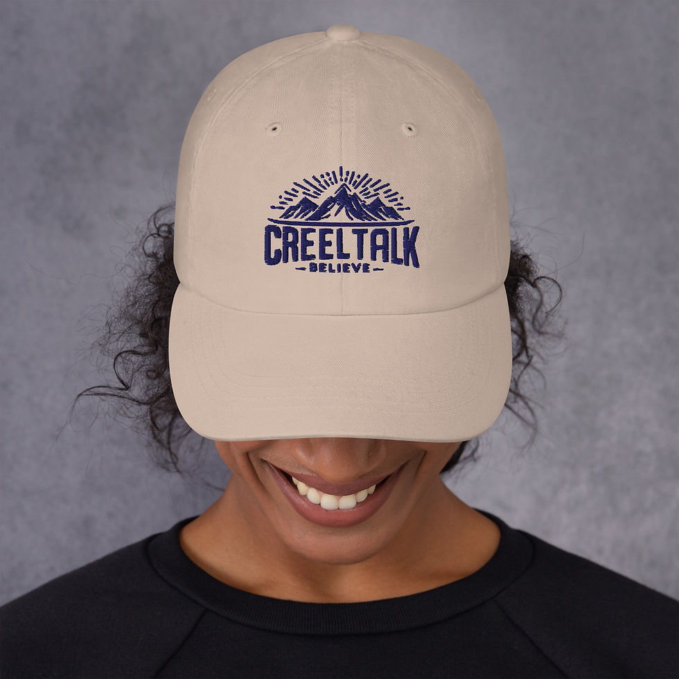 Thumbnail: Smiling person wearing unisex beige CREELTALK BELIEVE cap