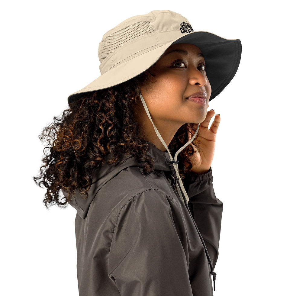 Thumbnail: Woman wearing a beige and black brimmed bucket hat