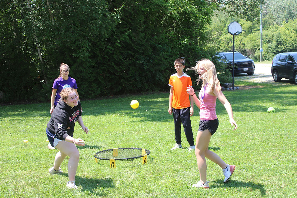 Campers and a Med Student playing Spike Ball