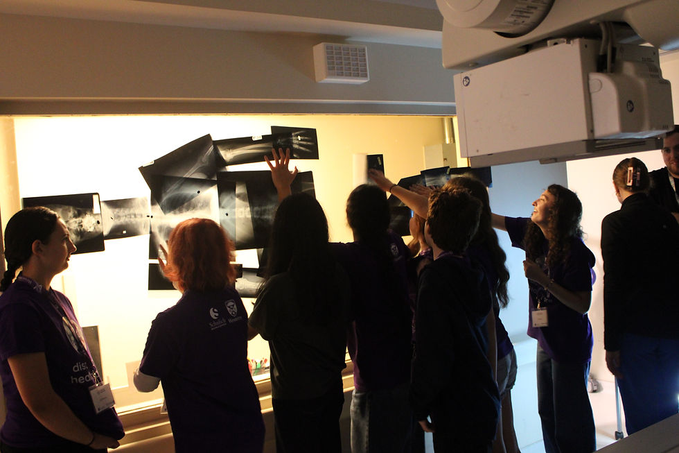 Campers in the x-ray lab putting together images