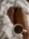 Hand-drawn digital illustration of black woman holding coffee, using warm tones,