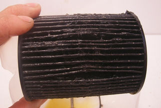 FAQ Spotlight: Dark Wet Stuff On Your Used Filter?