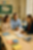 Parents discussing their child at a parent/teacher conference