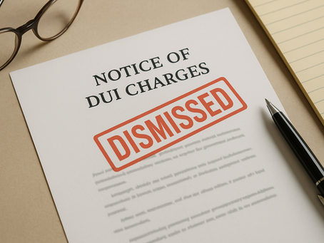 DUI charge paperwork stamped with “Dismissed” on attorney’s desk