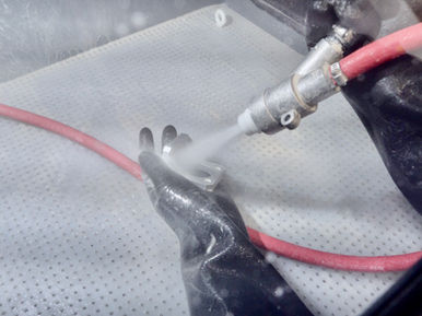Vapor Blasting Inside Cabinet.jpeg