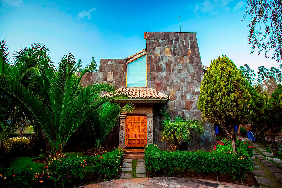 Colonial hacienda courtyard and surrounding gardens at Aranwa Valle Sagrado Hotel