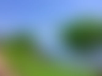 Luxury traveler enjoying a sunny coastal view in Lima.