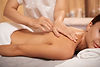 young-woman-getting-back-massage-spa-salon.jpg