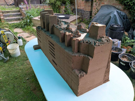 Practice model of sand sculpture of the Great Ormond Street Hospital cancer centre sand sculpture.