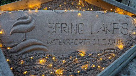 Night treatment of Spring Lakes logo