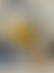 Candle with tunnelling, showing unburnt wax around the edges and a deep well around the wick.