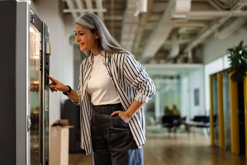 Employee using a workplace vending machine