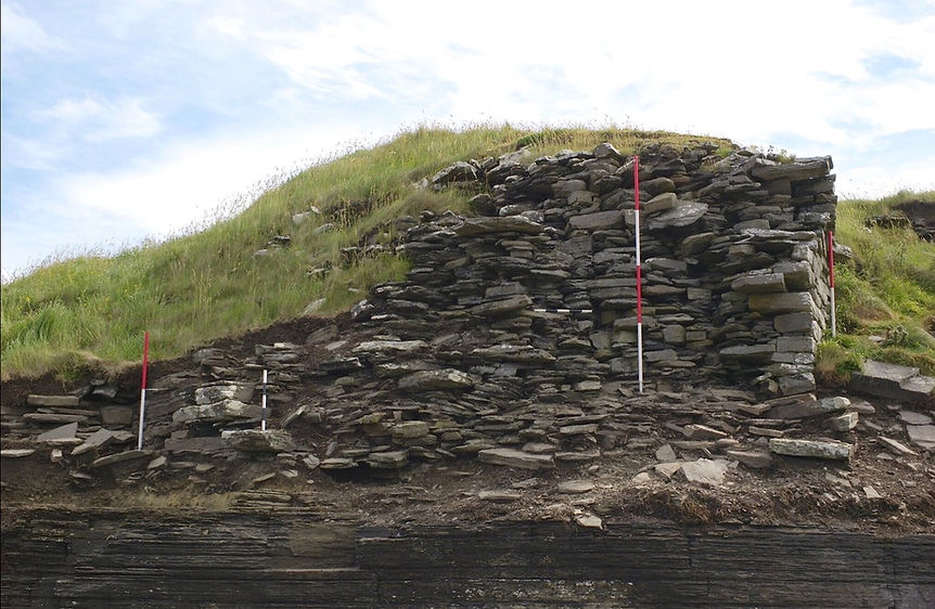 The main broch tower wall sectioned by the sea at South Howe, Rousay