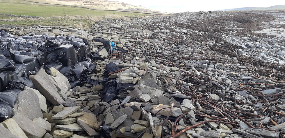 Site at Swandro covered with stone and seaweed