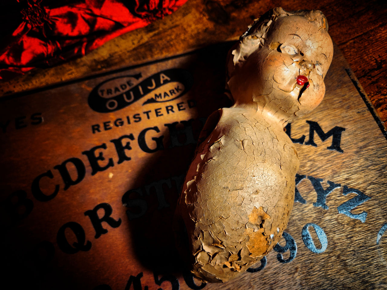 Cracked haunted doll