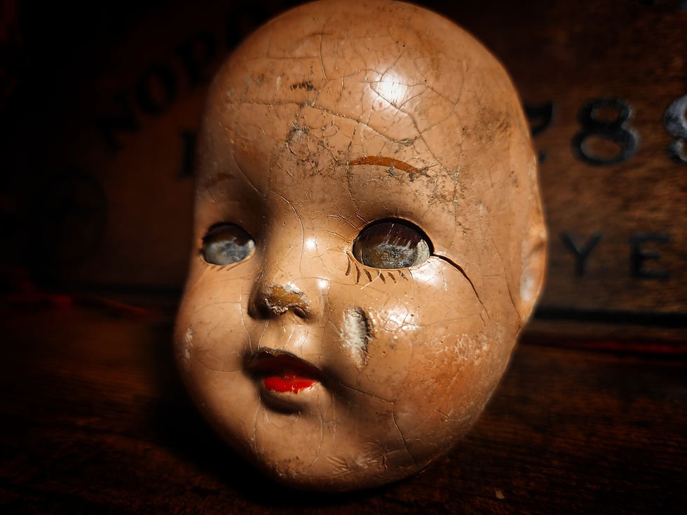 Thumbnail: Haunting Antique Doll Head With Glass Eyes