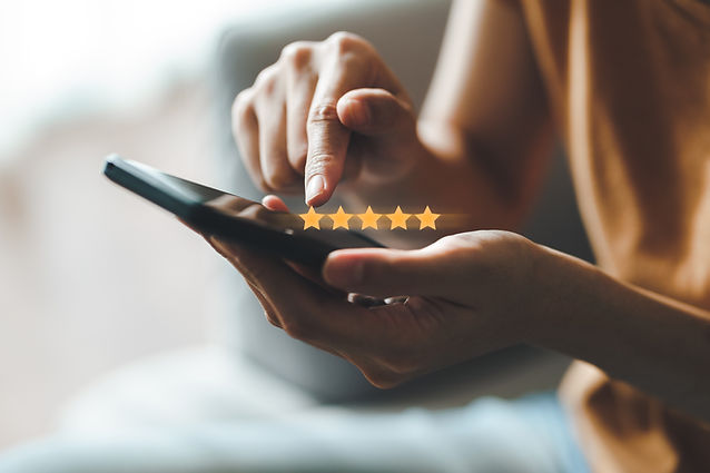 vecteezy_woman-customer-give-five-star-on-smartphone-rating_3287688.jpg