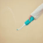 Peri postpartum bottle being squeezed