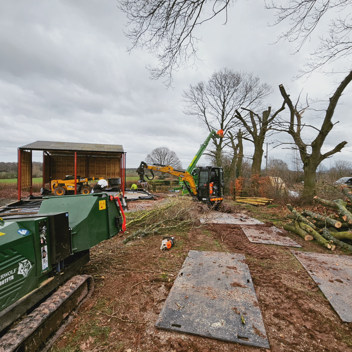 Site clearance in Hereford with machinery removing trees and preparing land for development