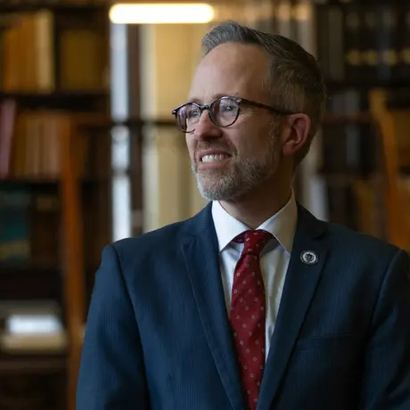 Representative Mark D. Sylvia stands in the State House Library in Boston. Credit: Eleonora Bianchi / The New Bedford Light