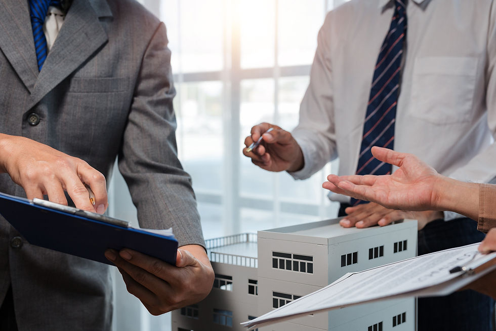 Business professionals closing on commercial real estate